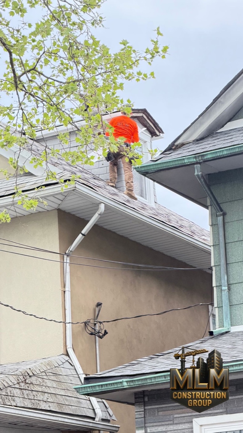 Flat roof repair work on a Brooklyn building