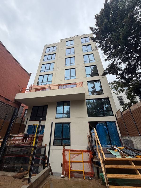 Finished exterior renovation luxury tower Brooklyn