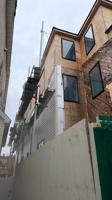 Full exterior renovation completed siding roofing Brooklyn