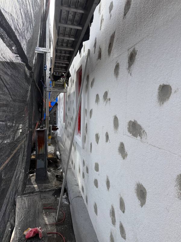 Full building scaffold stucco progress Brooklyn