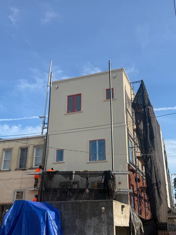 Close-up EPS EIFS base coat application