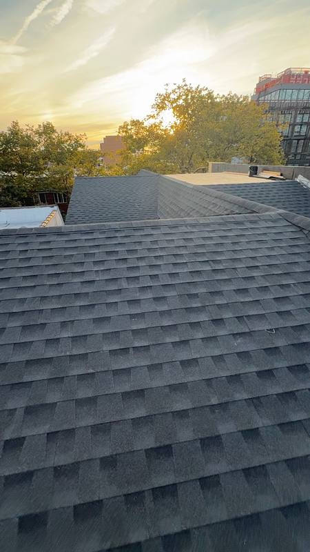 Completed GAF shingle roof beautiful sunset Brooklyn