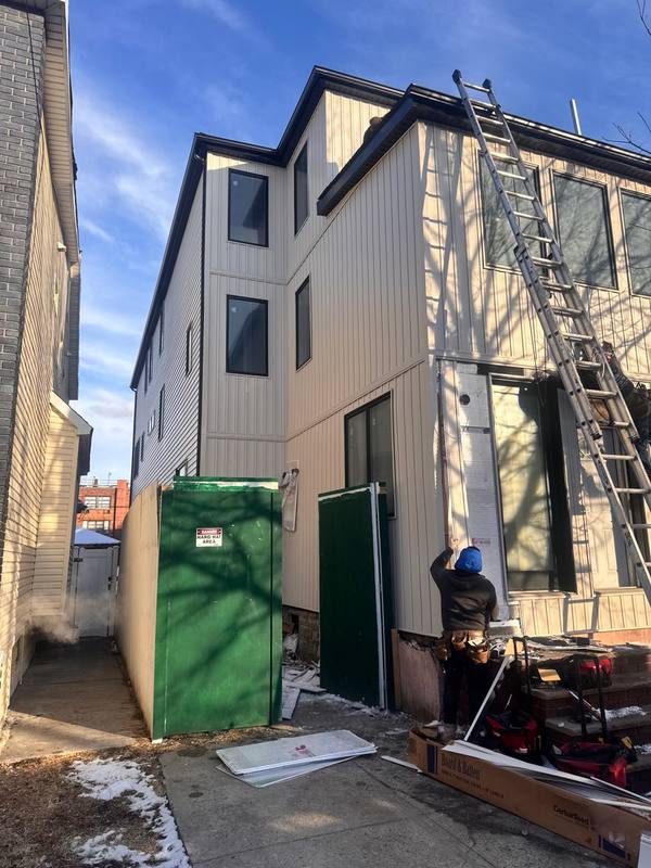 Completed siding installation front view Brooklyn NY