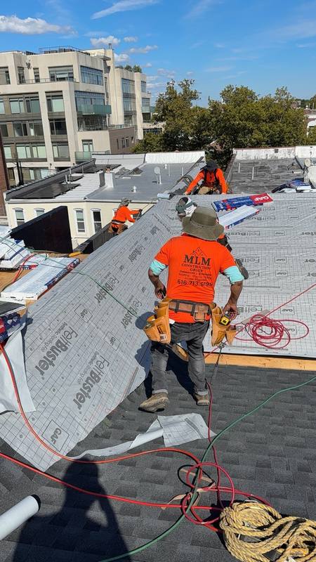Worker steep slope safety harness shingle Brooklyn