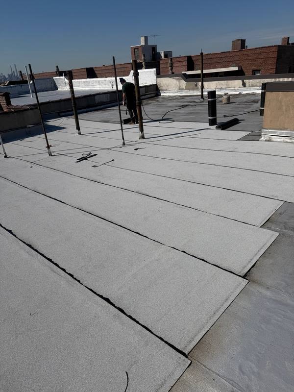 Completed modified bitumen flat roof clean seams