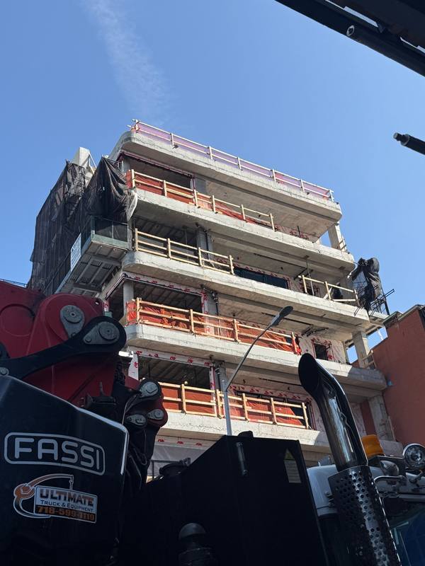 Stucco EIFS installation luxury building Williamsburg