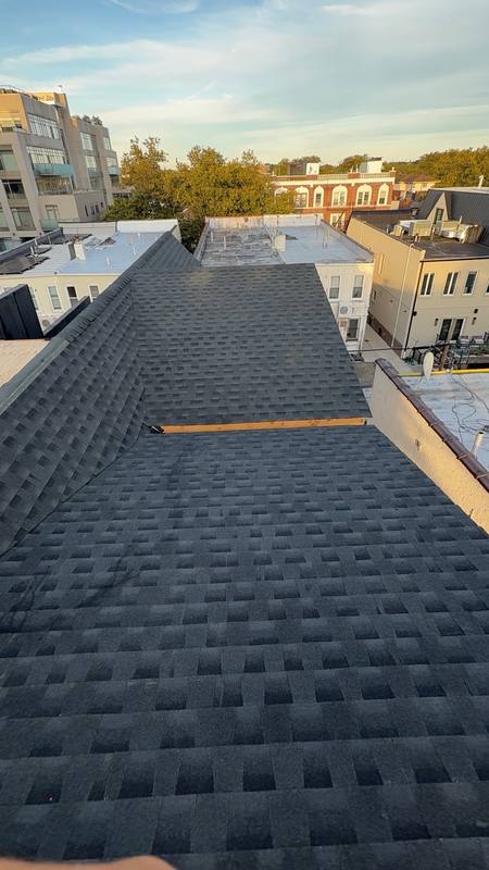 Drone mid-install shingle roof Brooklyn
