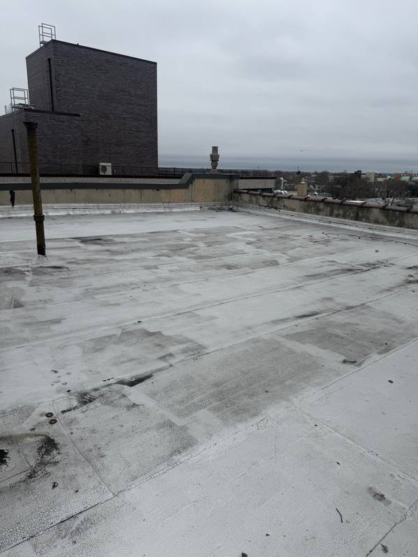 Full view old flat roof before MLM Construction