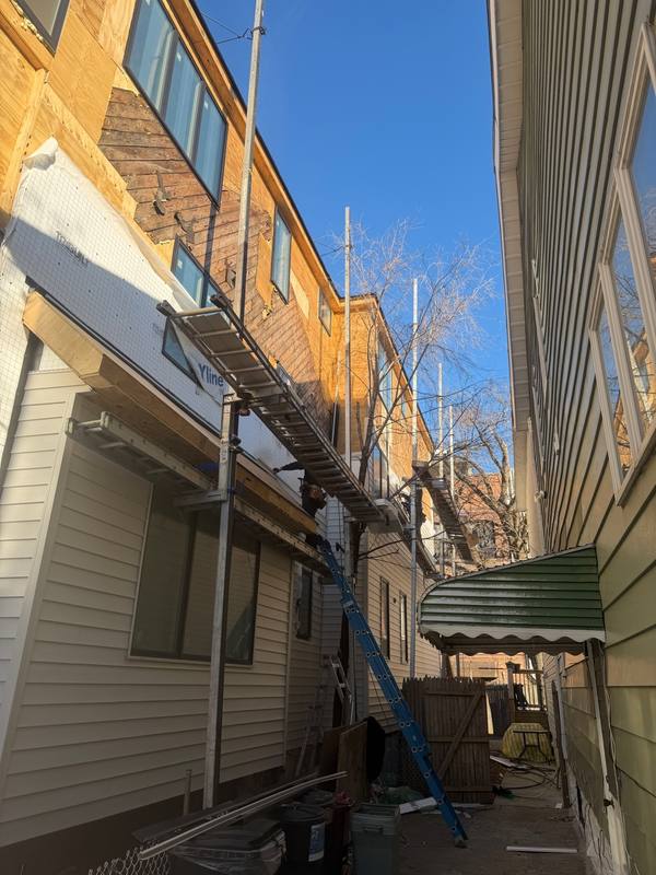 Weather barrier DRYline installed before siding Brooklyn