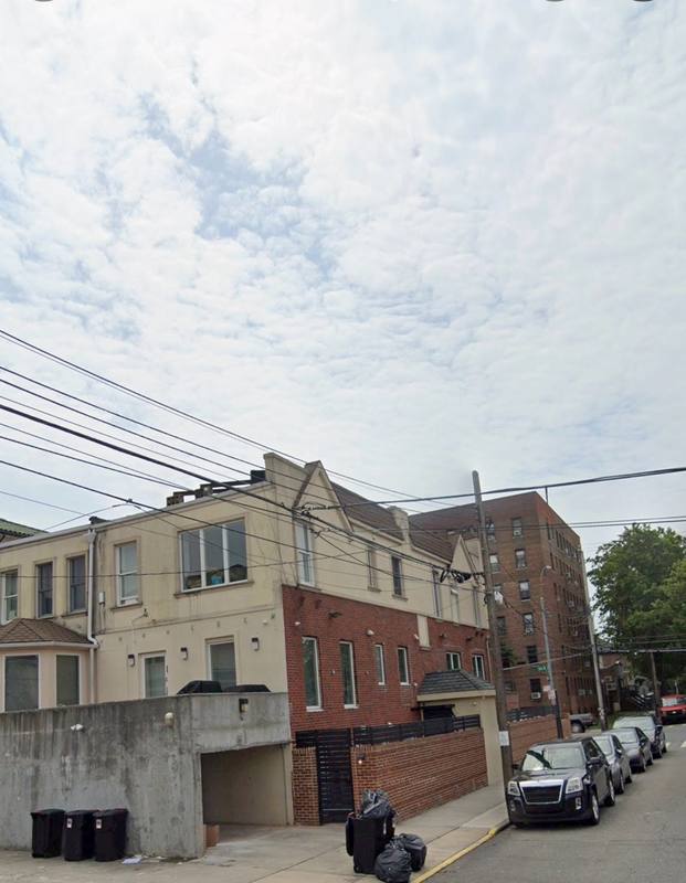 Building corner view before renovation Brooklyn